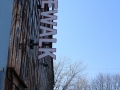 "Sidewalk" signage on older building